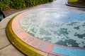 Historic Sydney Cove map on circle stone at Circular Quay.